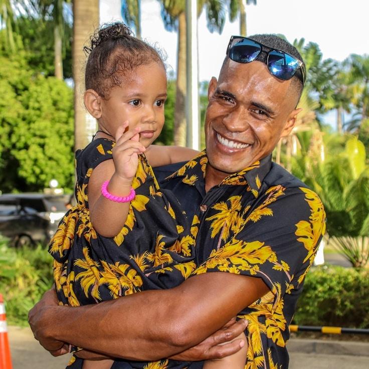 Avery Lin, Lead Design Curator at Sunrise Ocean Platform, reviewing corporate floral arrangements